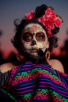woman in red and blue floral dress with white mask