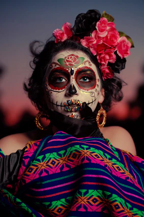 woman in red and blue floral dress with white mask