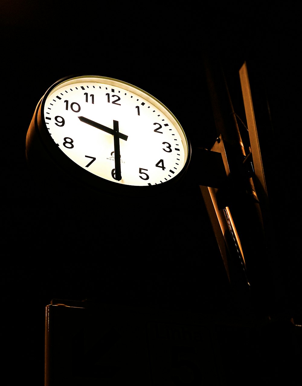 black and white analog wall clock