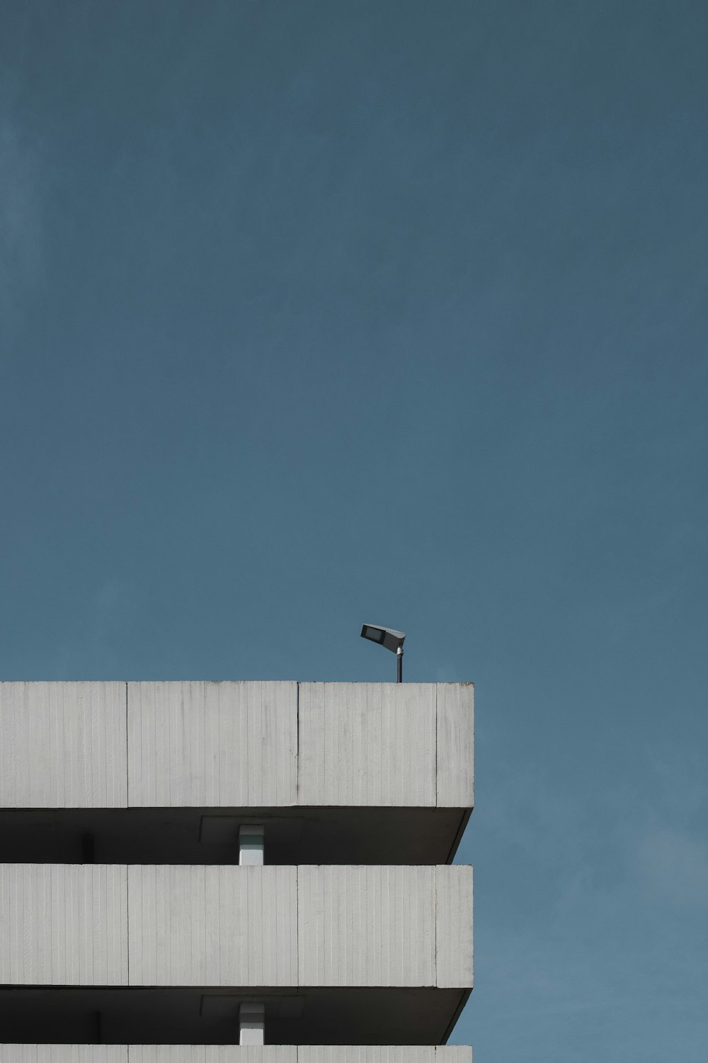 brown concrete building under blue sky during daytime