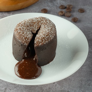 chocolate cake on white ceramic plate