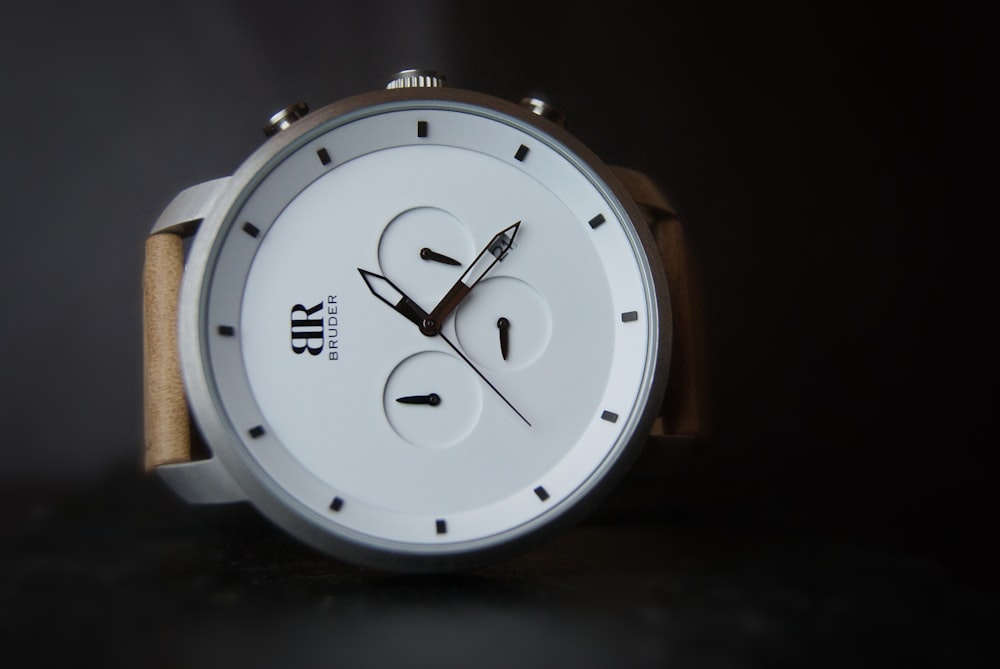 silver and white analog watch