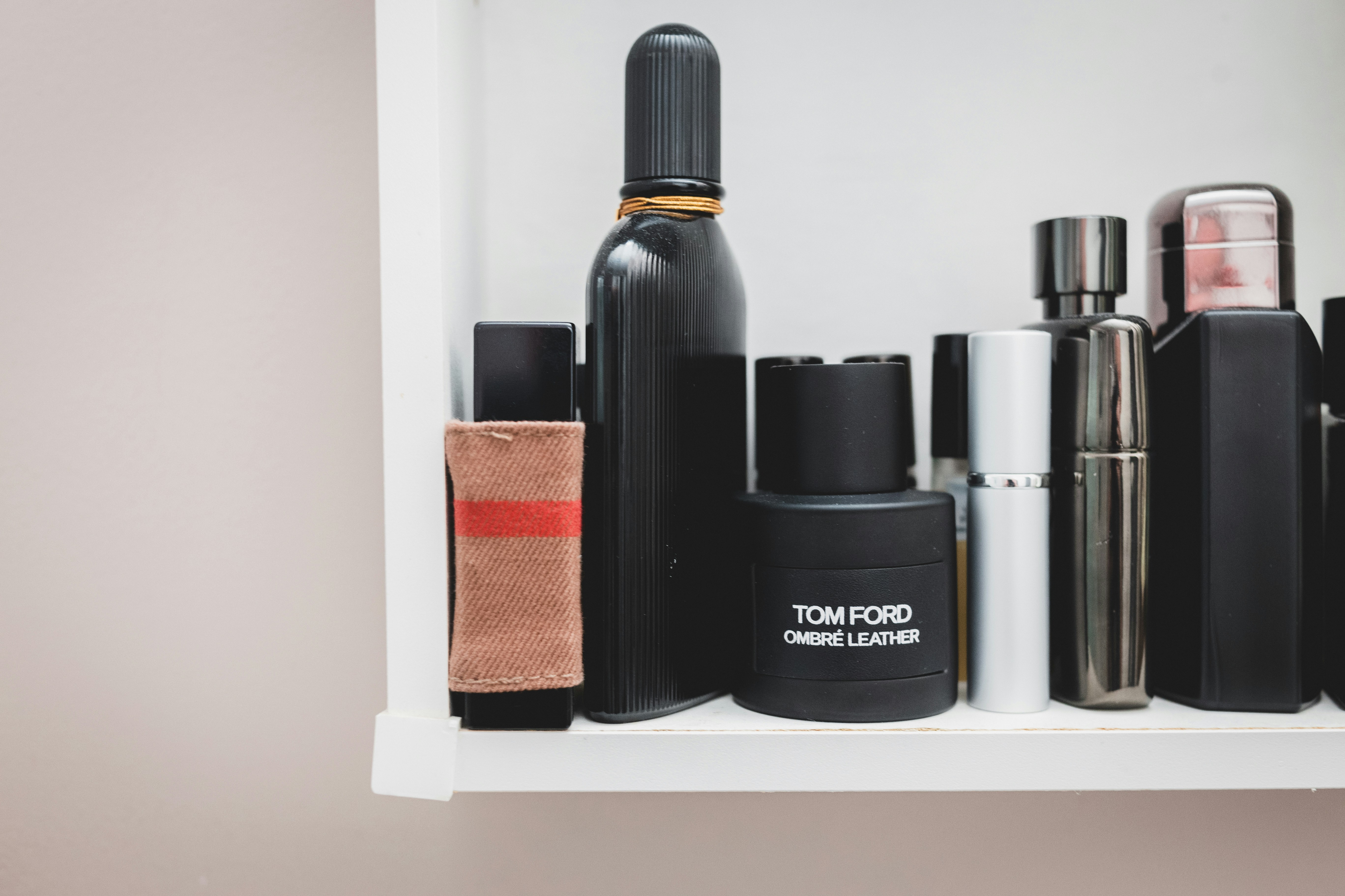 black and silver spray bottle