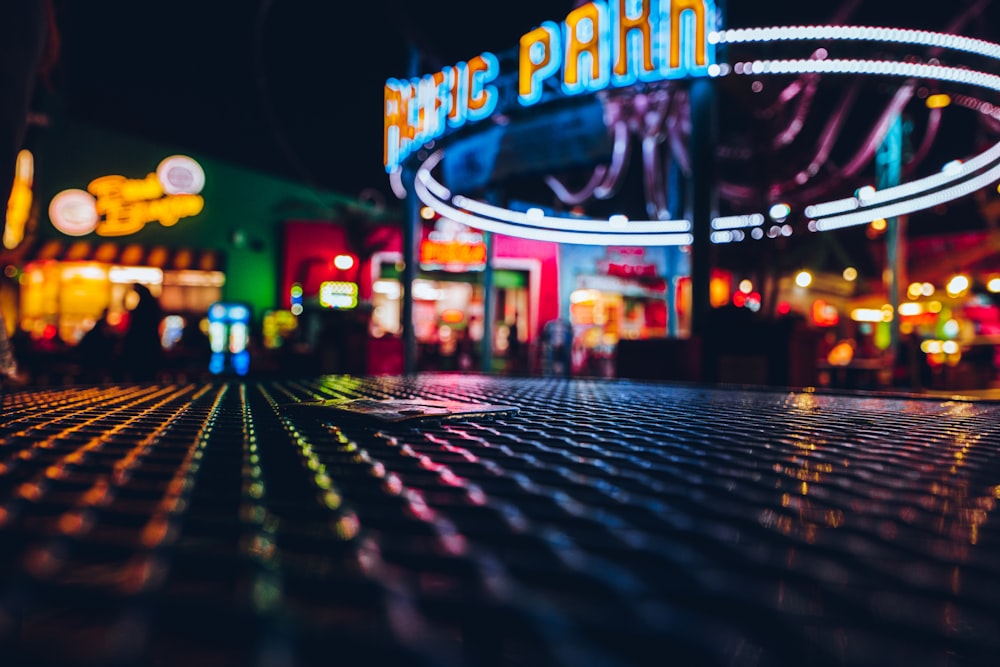 a blurry photo of a city street at night