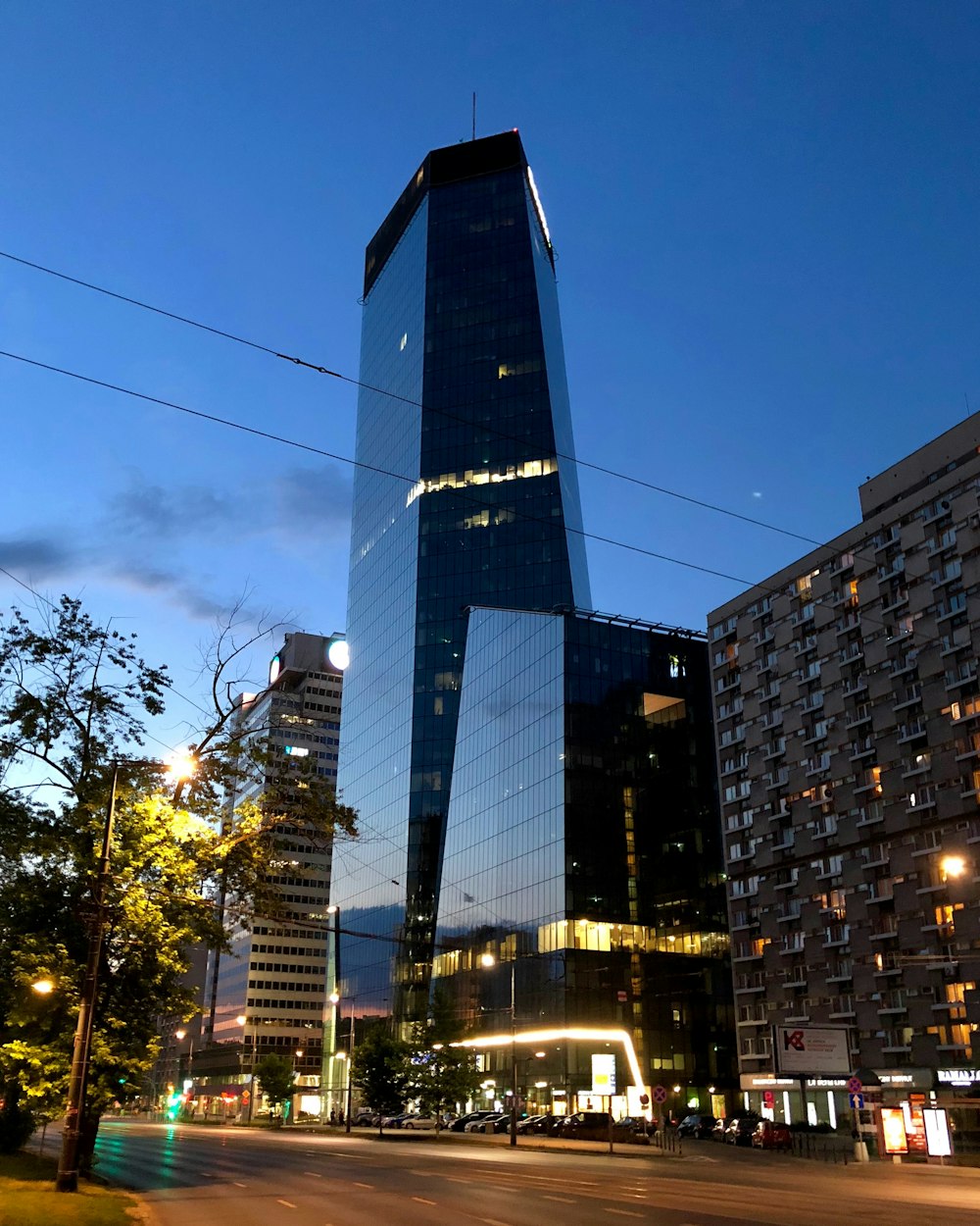 black and white concrete building during night time