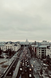 Aerial view of a busy city with cars.