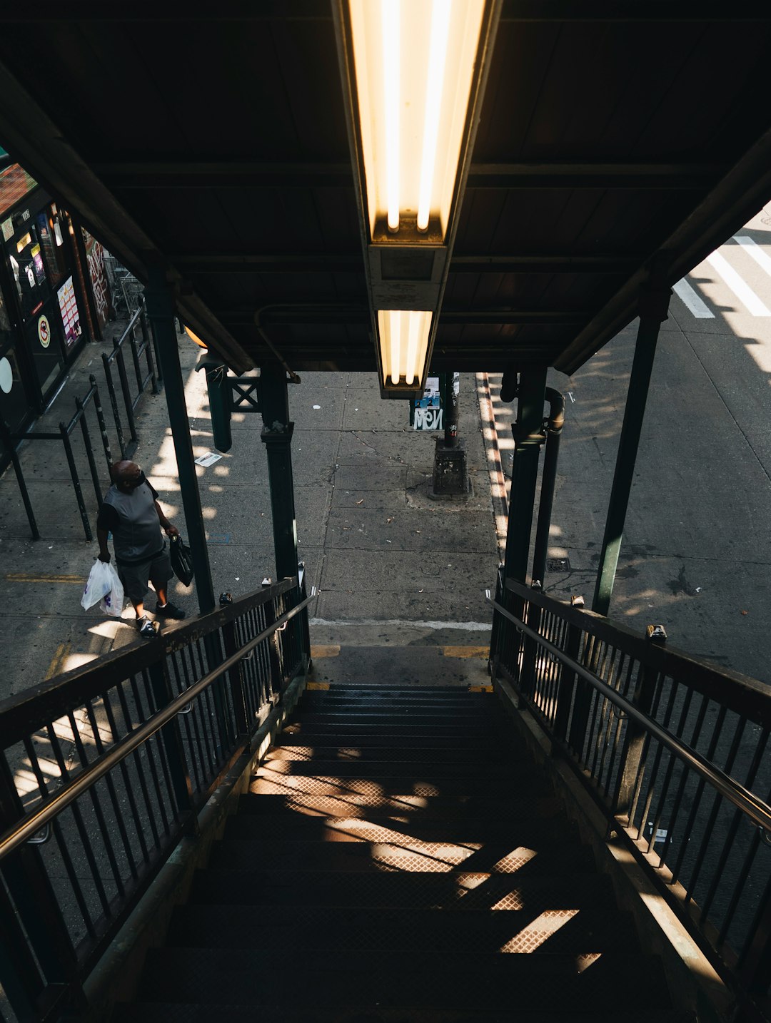 people walking on wooden bridge during daytime