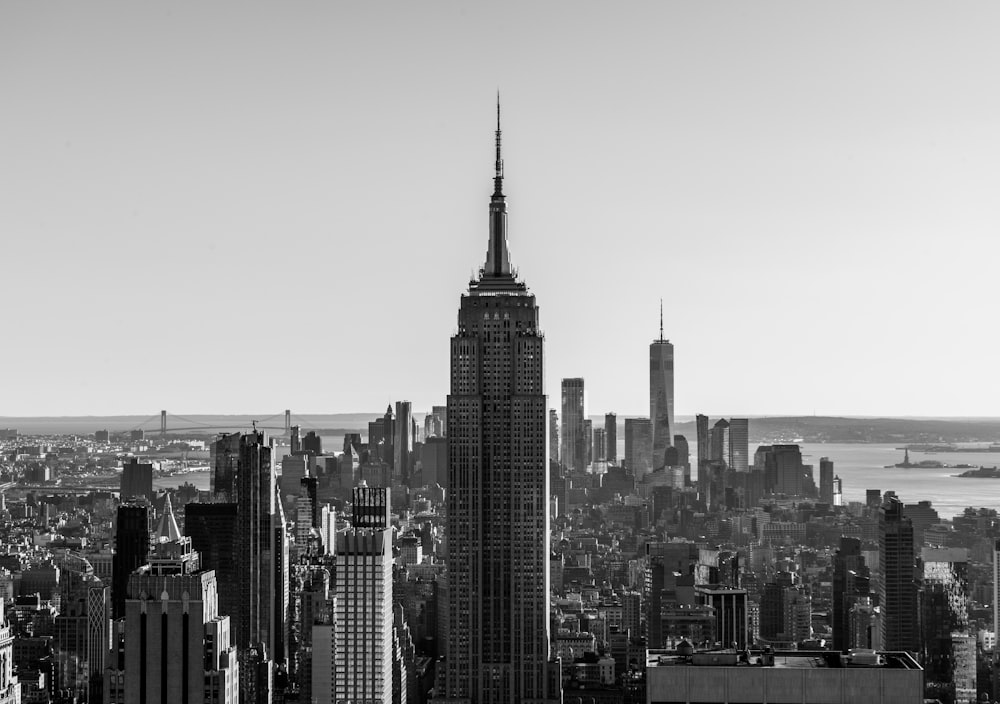 grayscale photo of city buildings