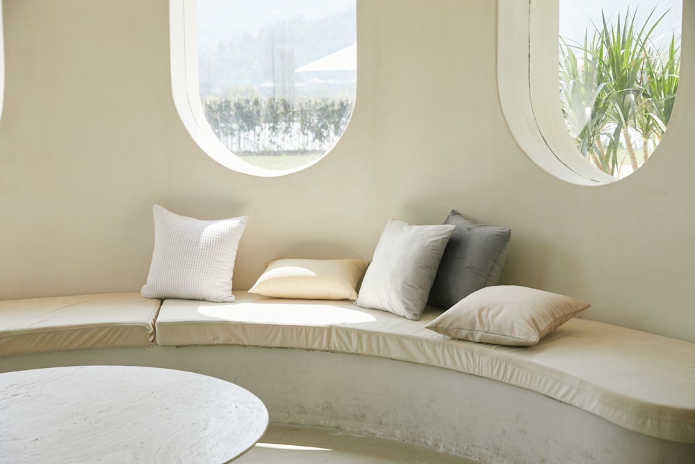 white sofa near round table