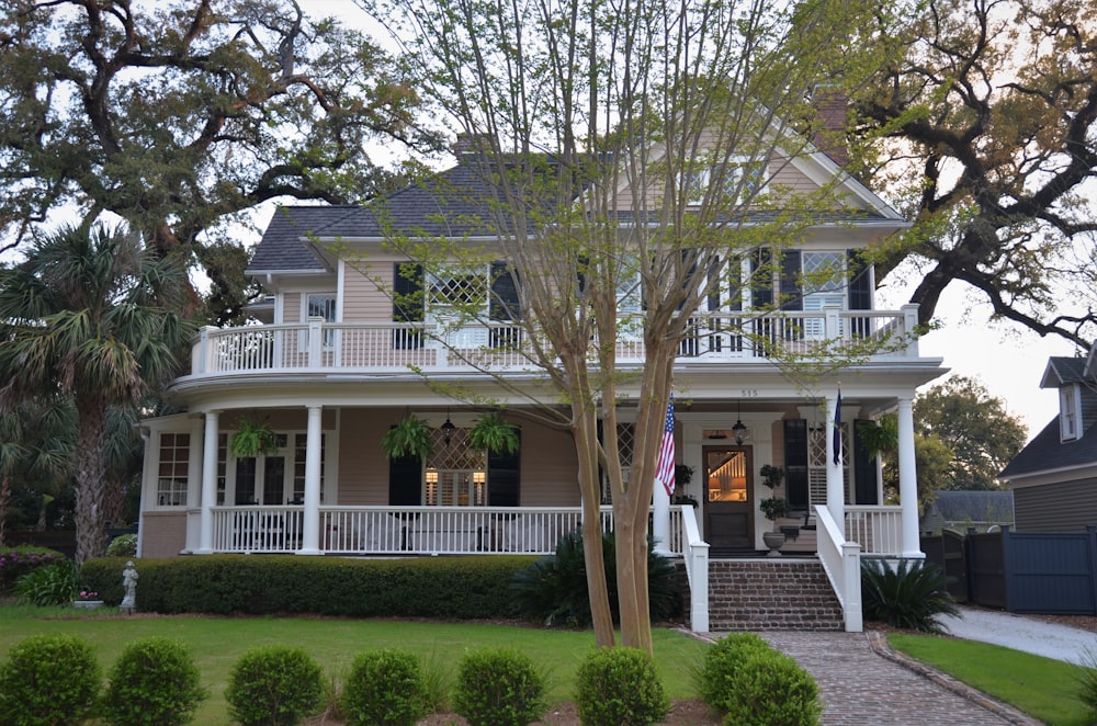 white and gray 2 storey house