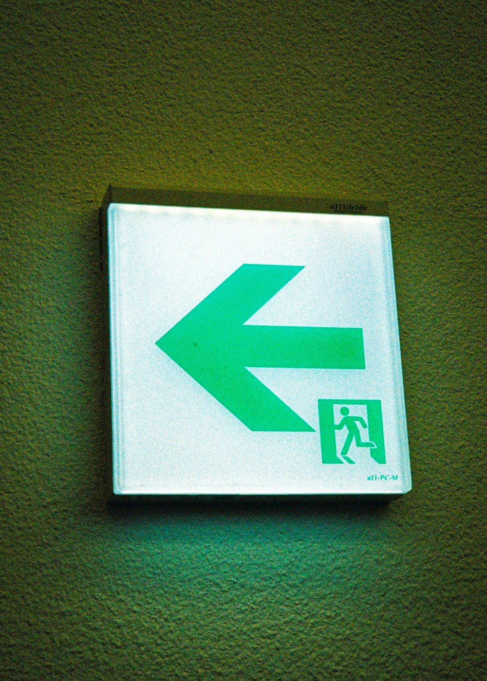 white and green x sign