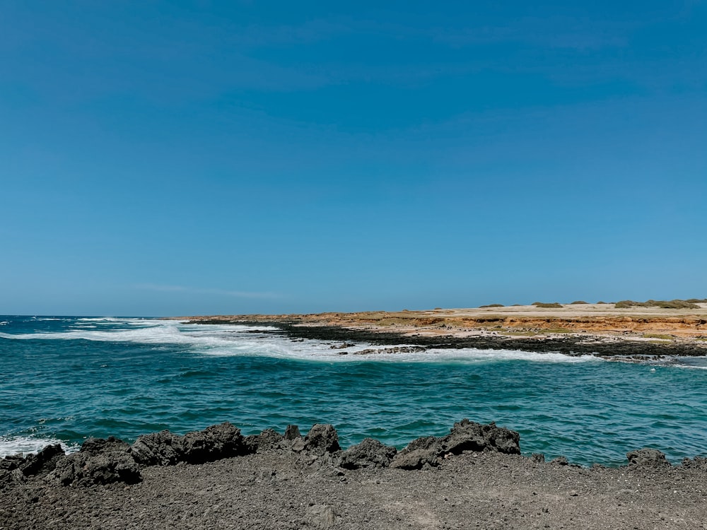 blue sea under blue sky during daytime