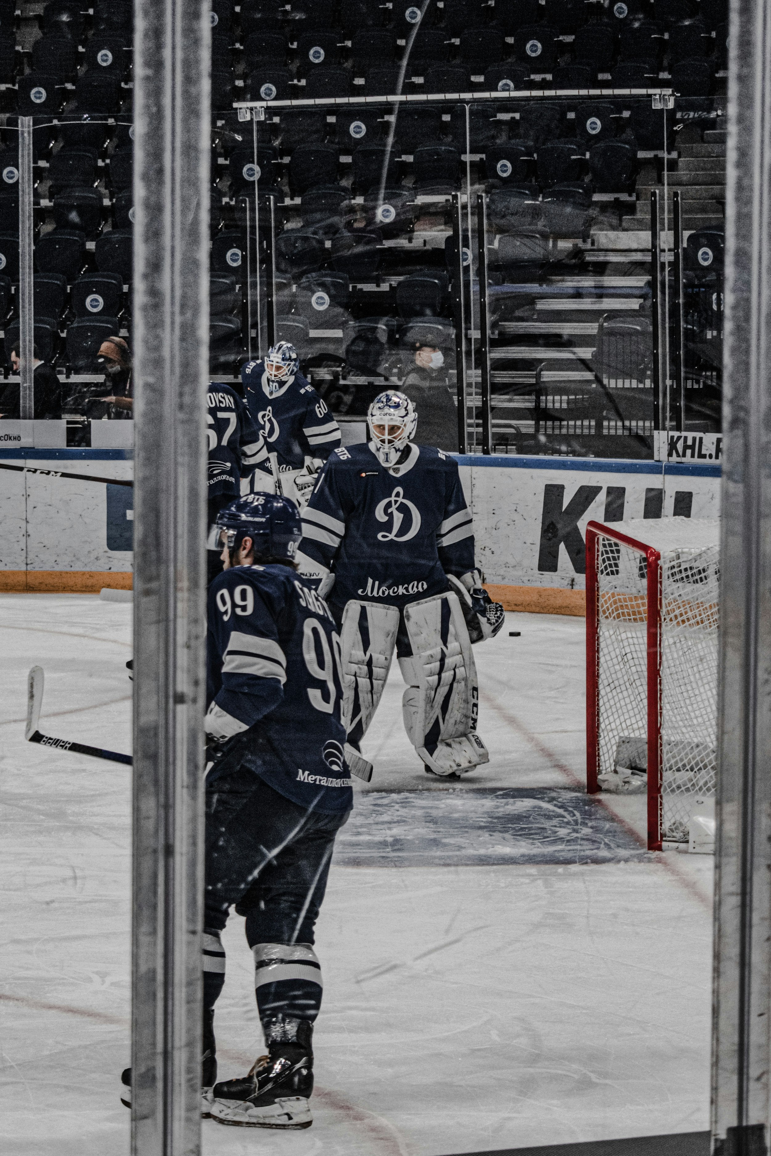 ice hockey players in ice hockey field