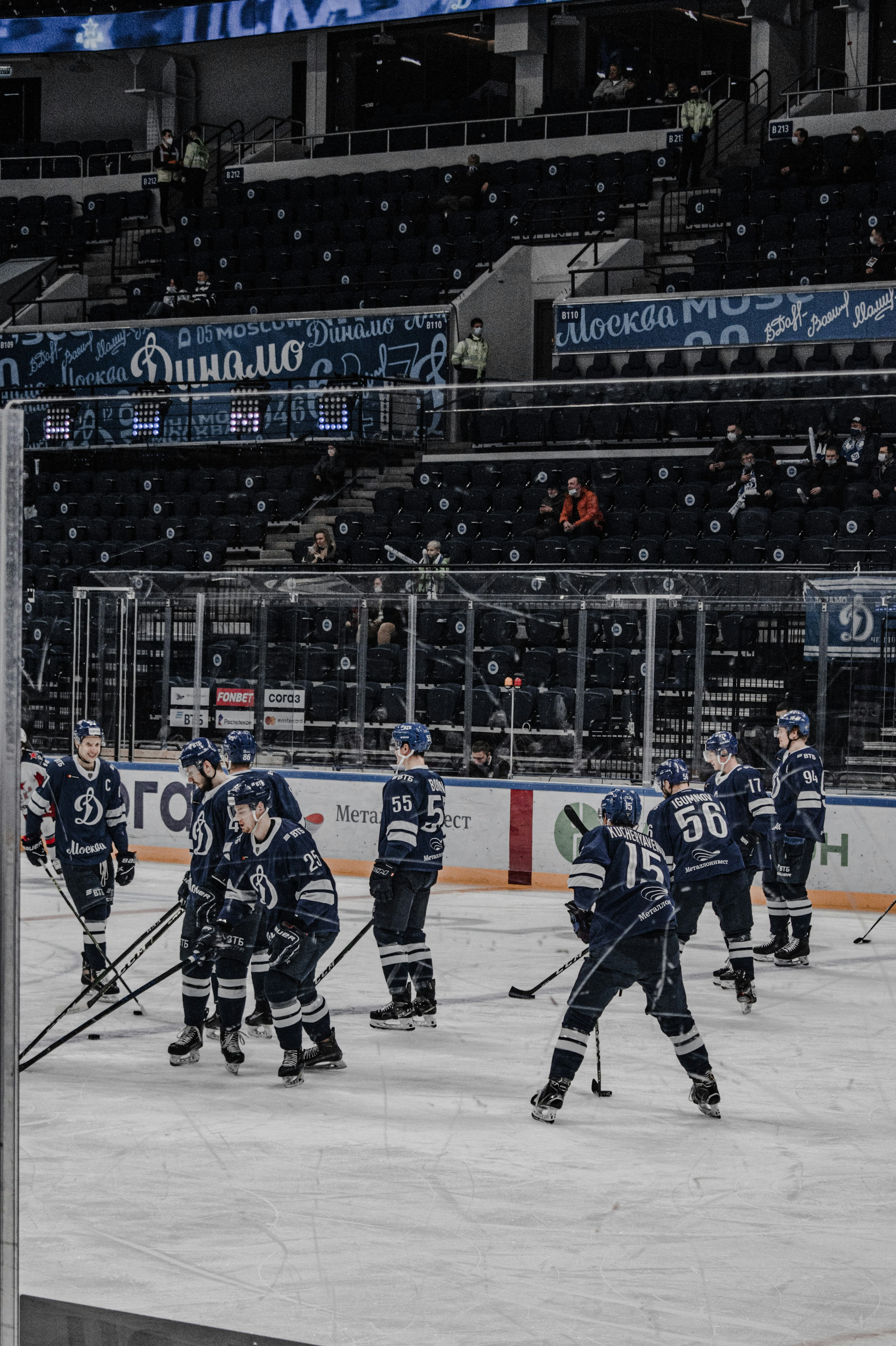 ice hockey players on ice hockey stadium