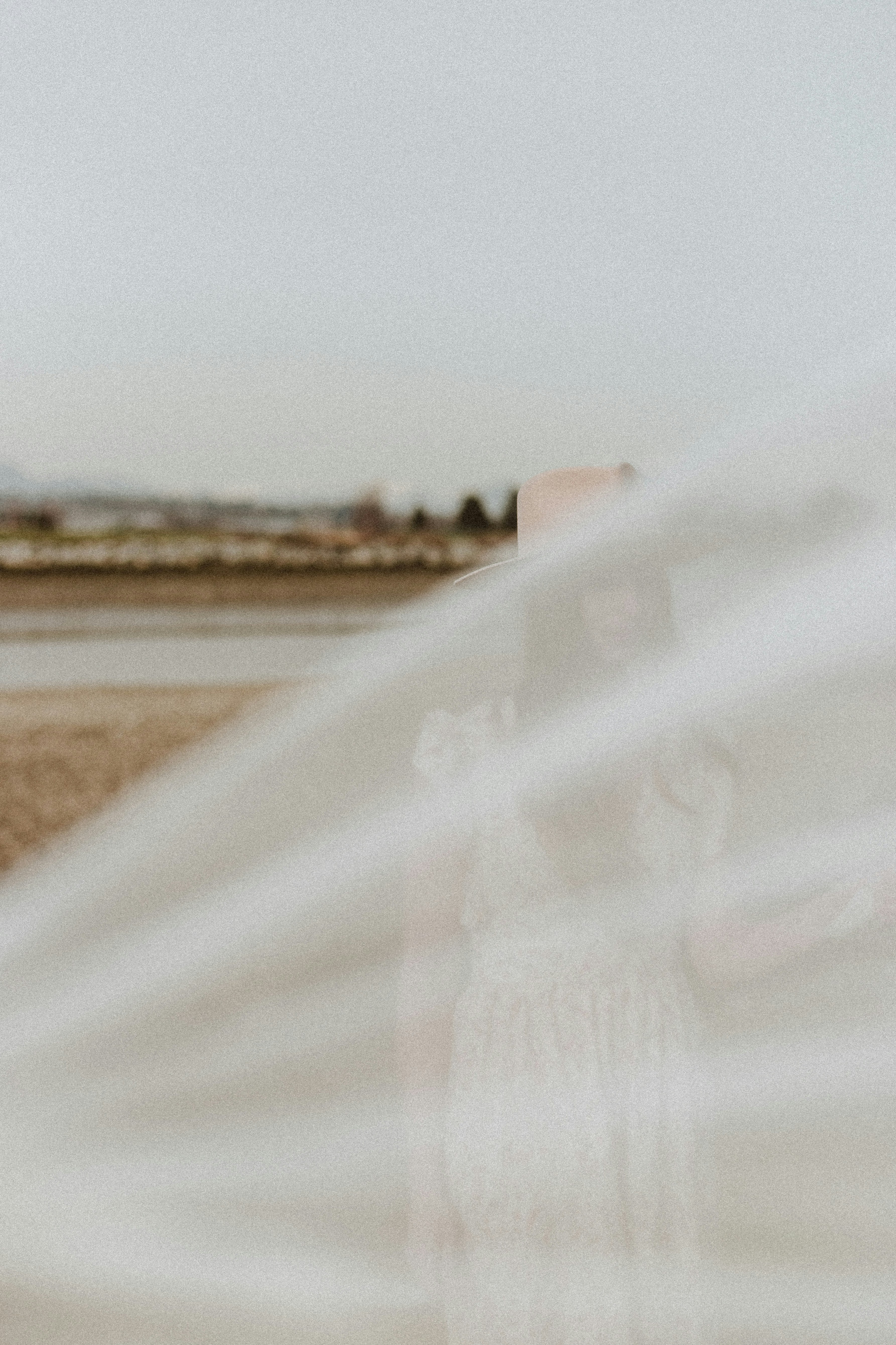 A side-by-side comparison of photographs showing one scarf styled in five different ways (as a necktie, headwrap, wrist accessory, belt, and bag adornment)