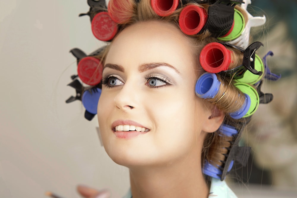 woman with red and blue hair clip