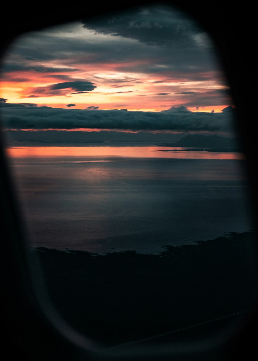 body of water during sunset