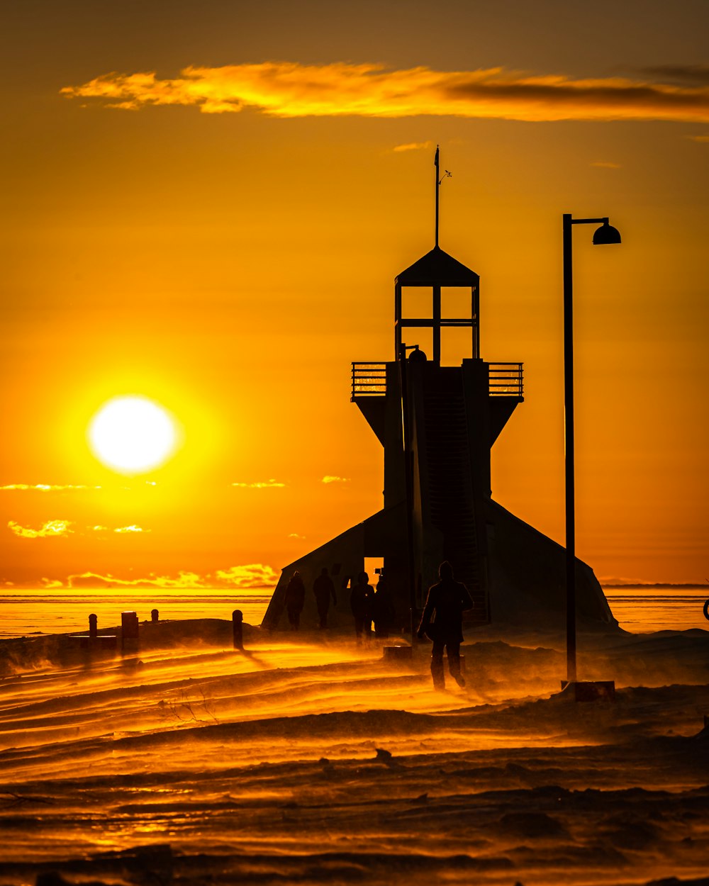 silhouette of building during sunset