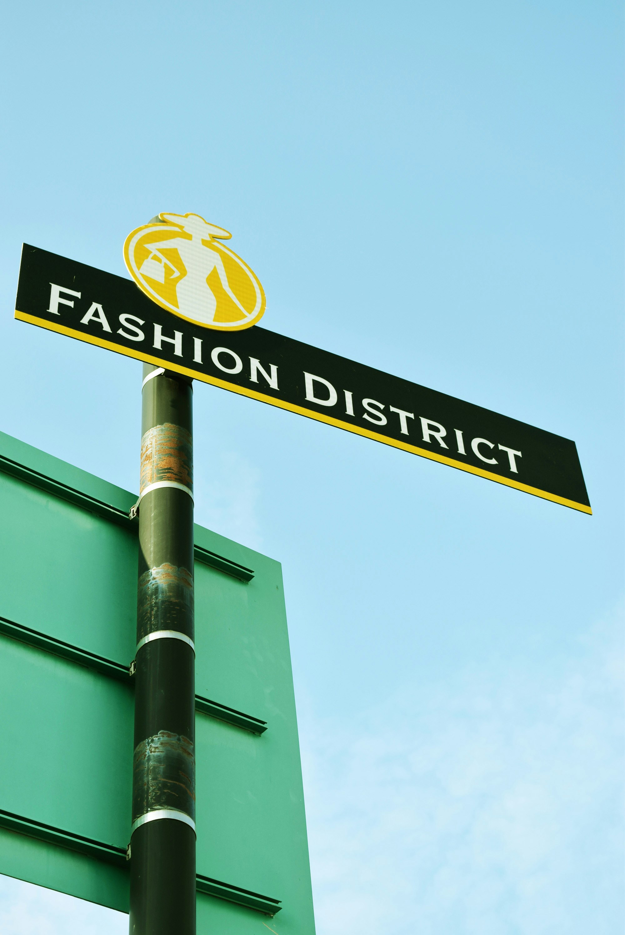 black and yellow street sign