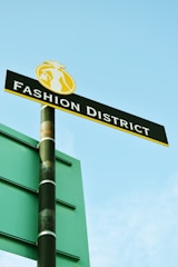 black and yellow street sign