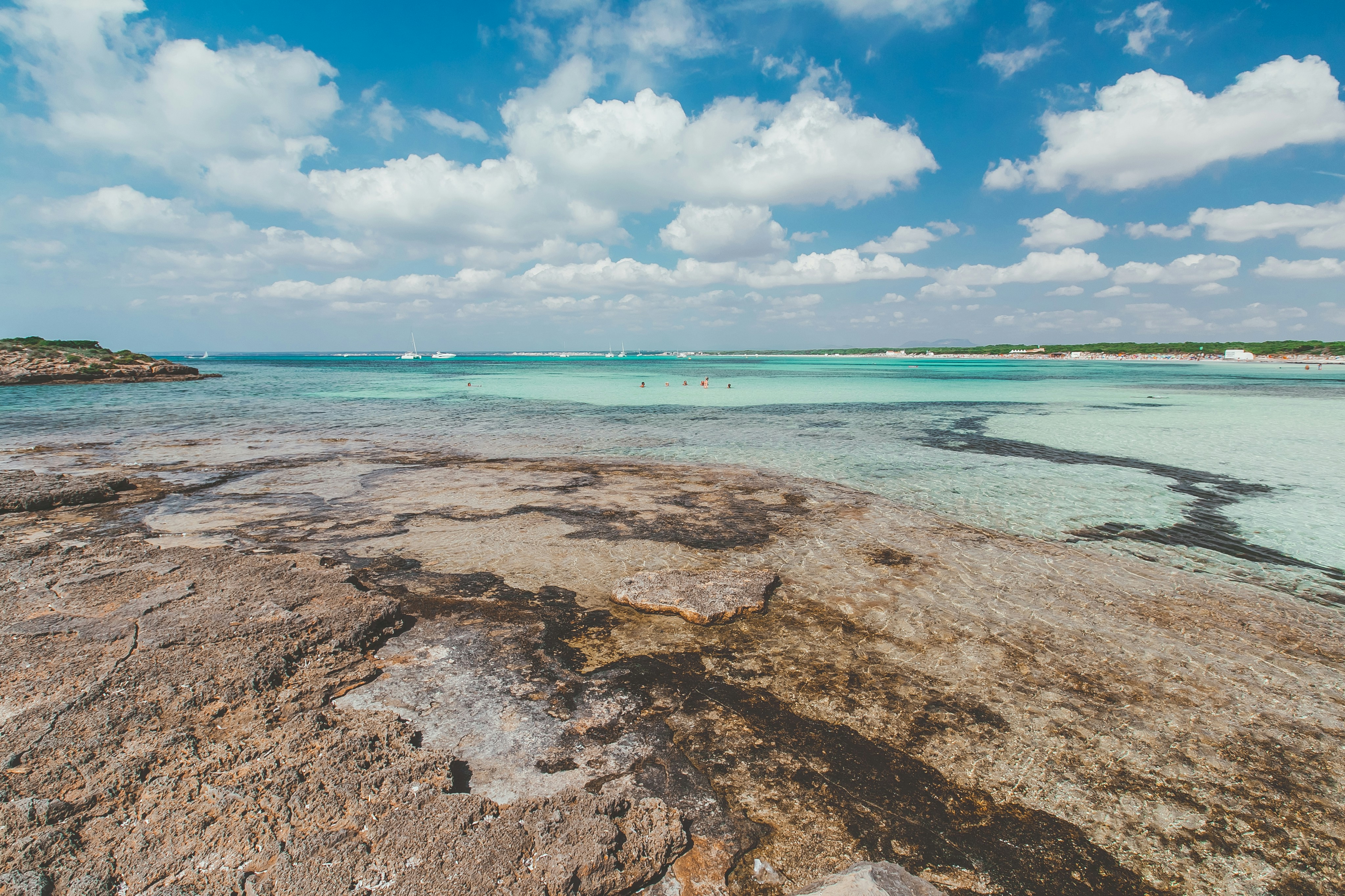 brown sand near body of water during daytime, Palma De Mallorca Majorca Majorica Balearic Island landscape sea view beach Azure Blue water sand Summer holidays summer vacation journey with blue sky