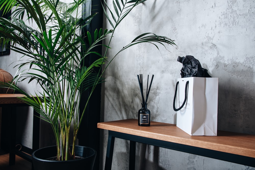 green plant on brown wooden table