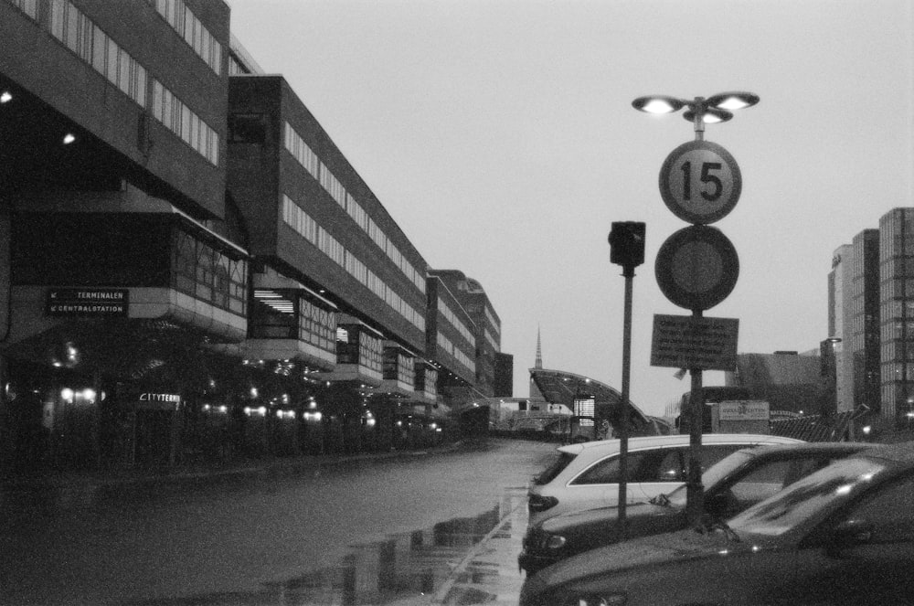 grayscale photo of city buildings