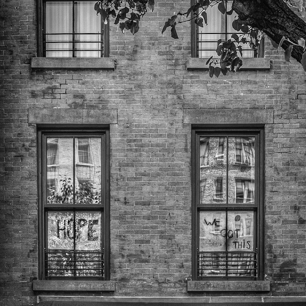 grayscale photo of window frame