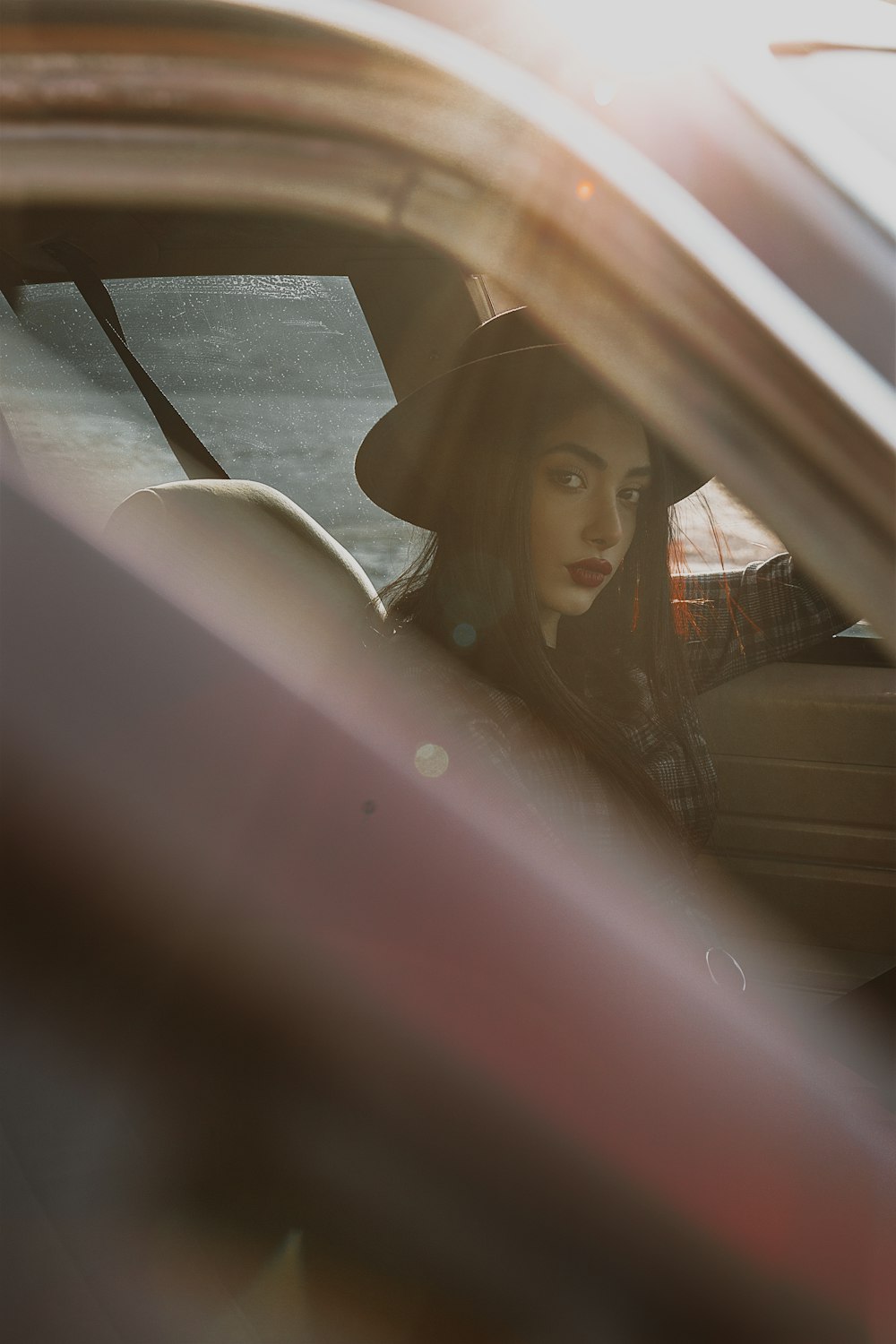 woman in car during daytime