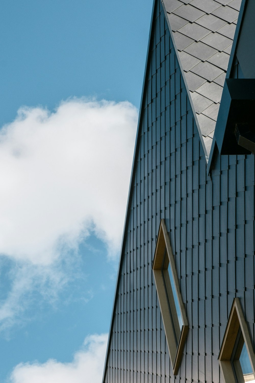 black concrete building under blue sky during daytime