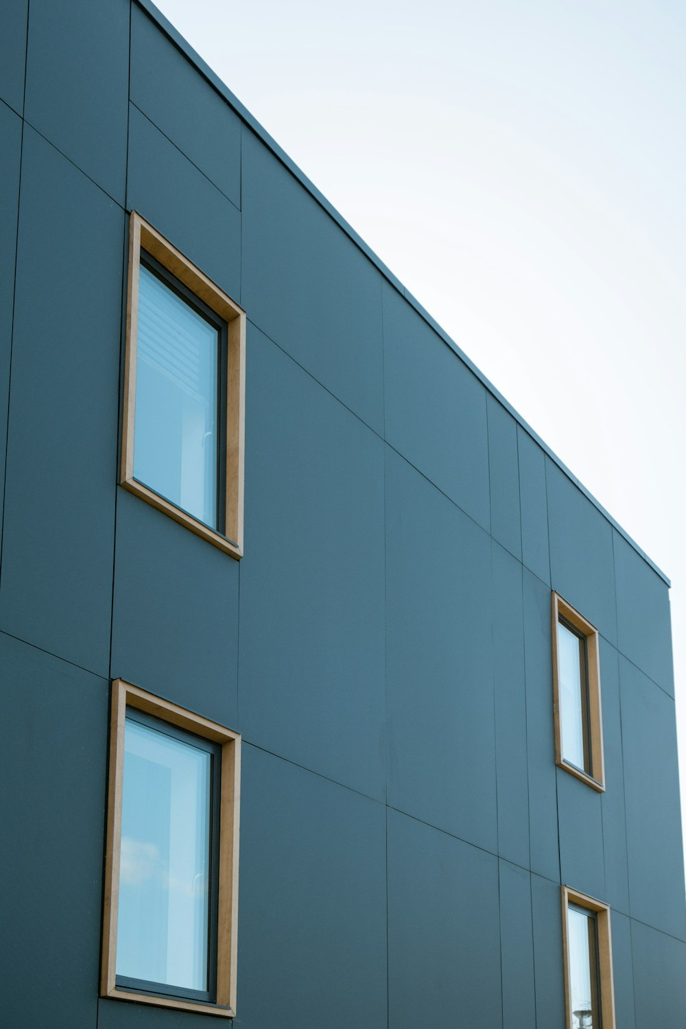 gray concrete building with glass window