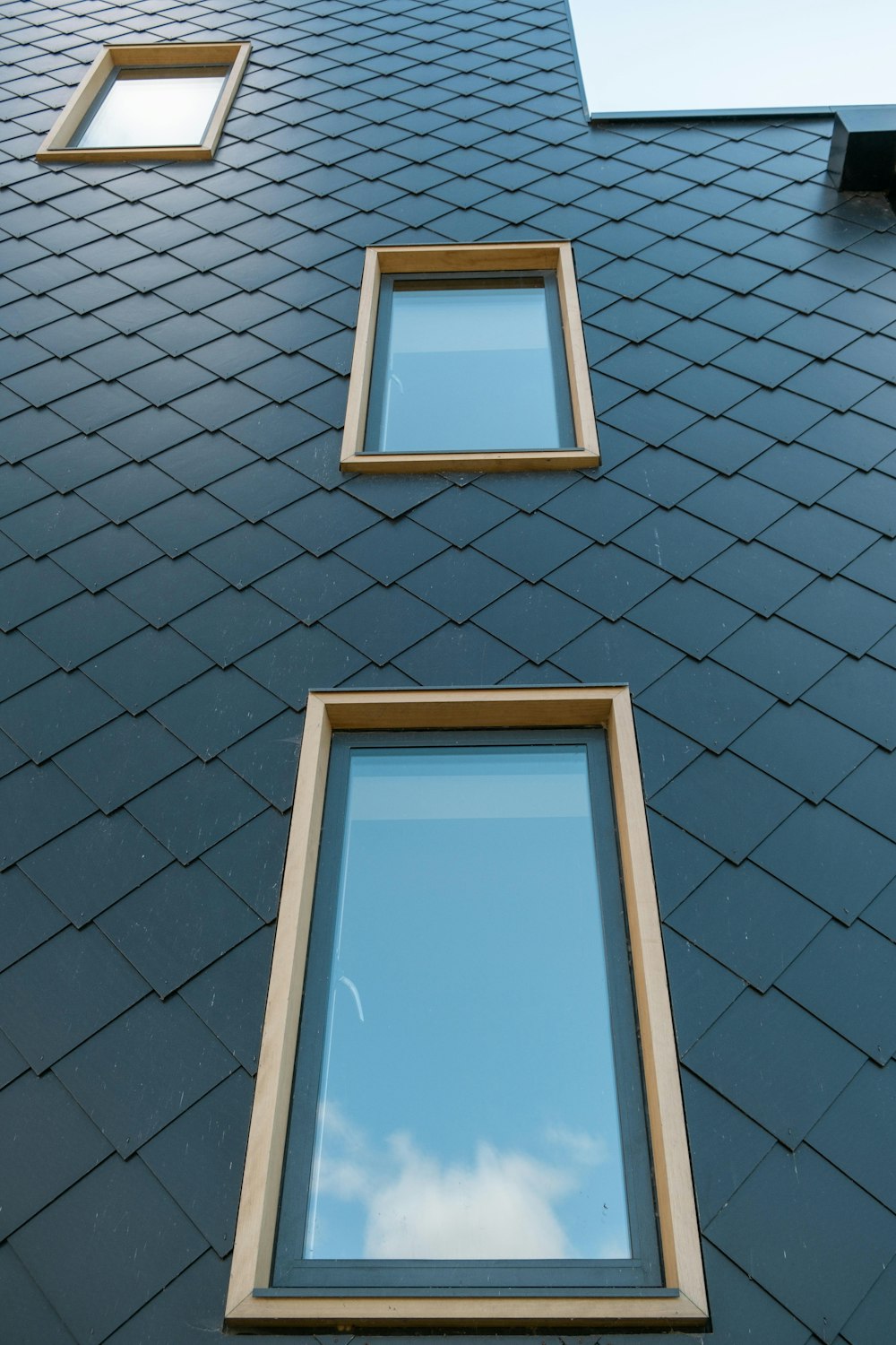 brown wooden framed glass window