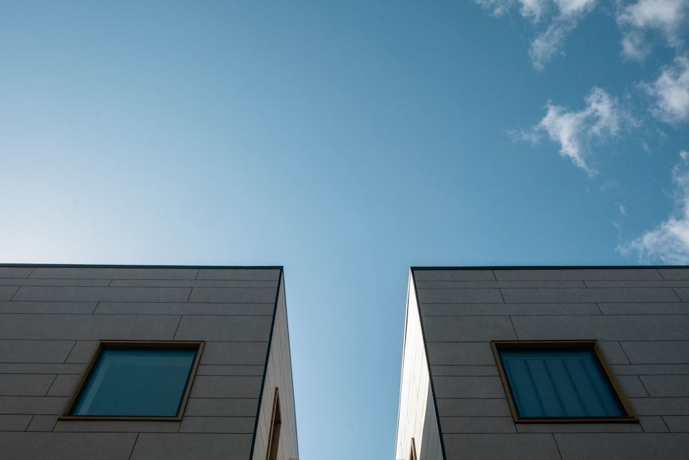 white concrete building under blue sky during daytime