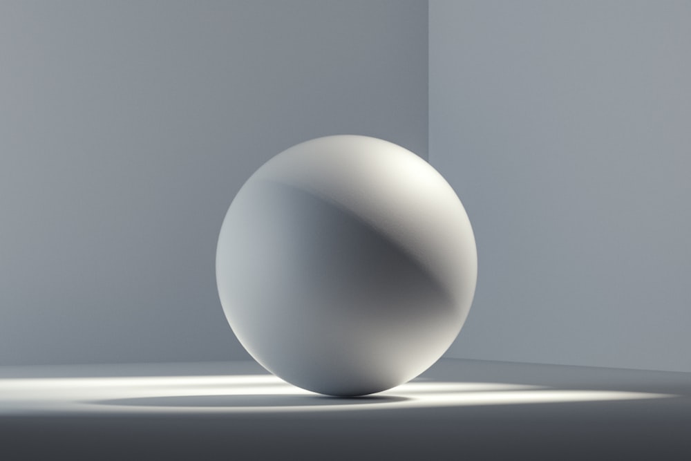 white egg on white surface