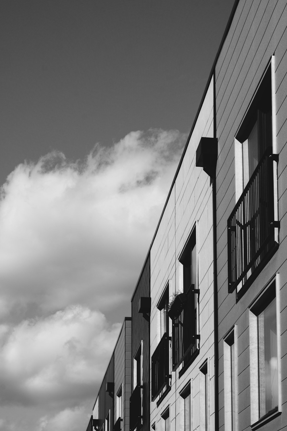 grayscale photo of concrete building