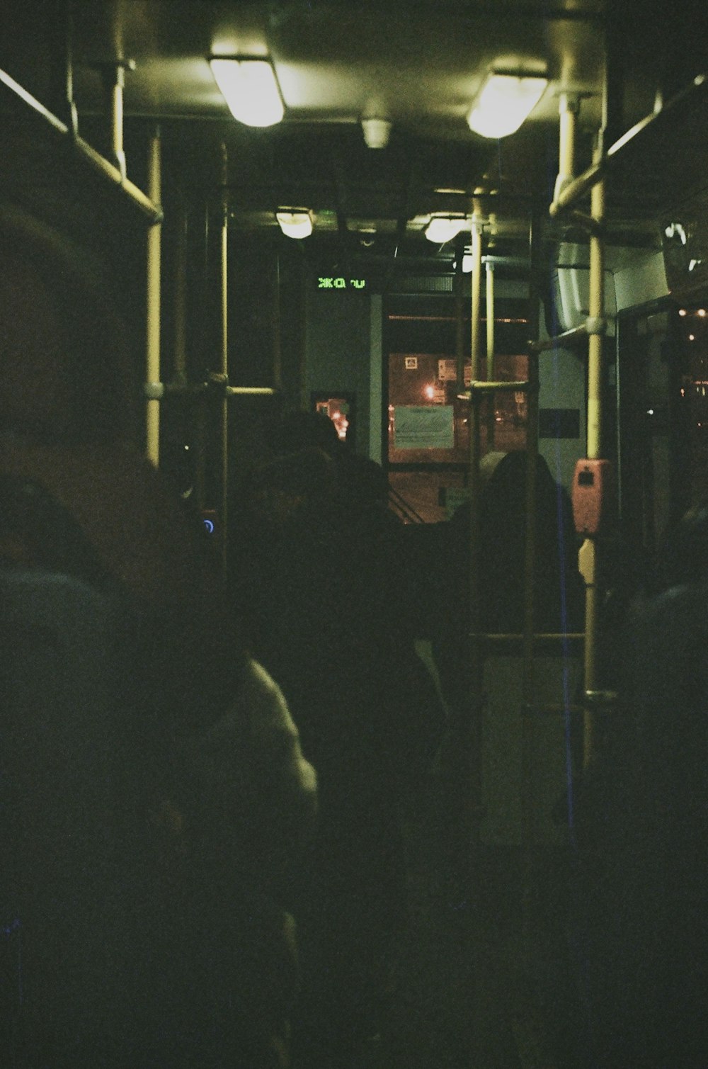 people in train during night time
