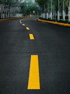 yellow line on gray asphalt road