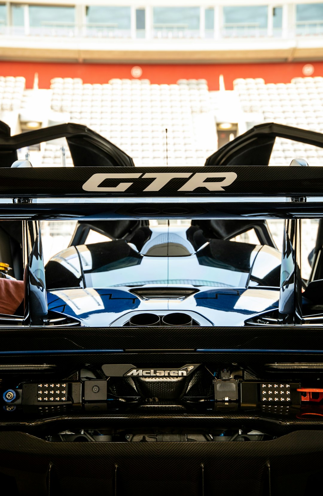 blue and black car in a garage