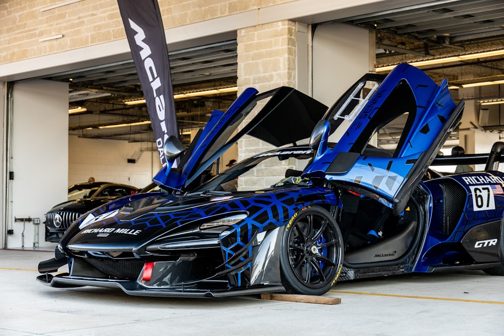 blue and black lamborghini aventador