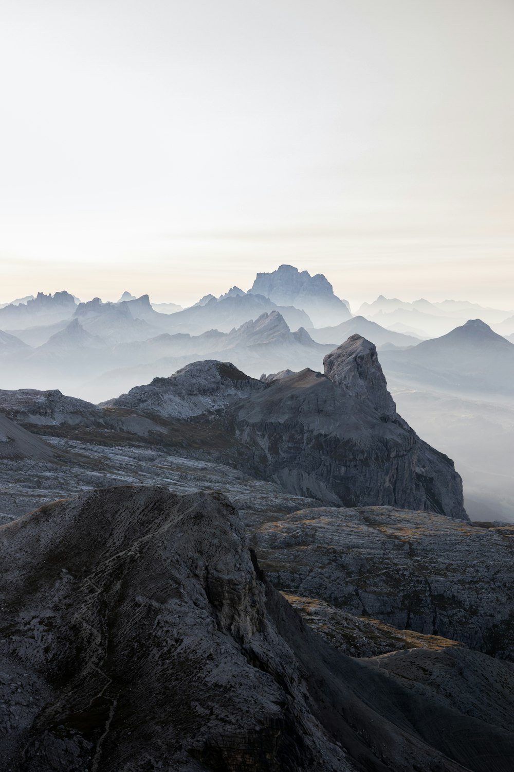 snow covered mountain under cloudy sky during daytime