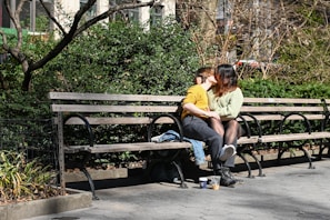 A couple enjoying a romantic moment in a scenic park.