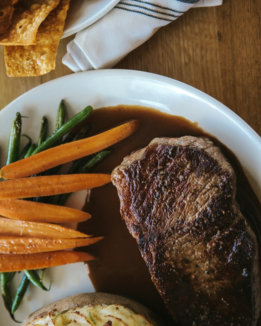 grilled meat on white ceramic plate