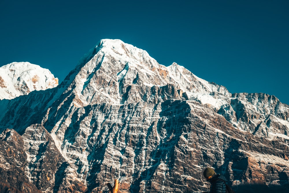 brown rocky mountain under blue sky during daytime