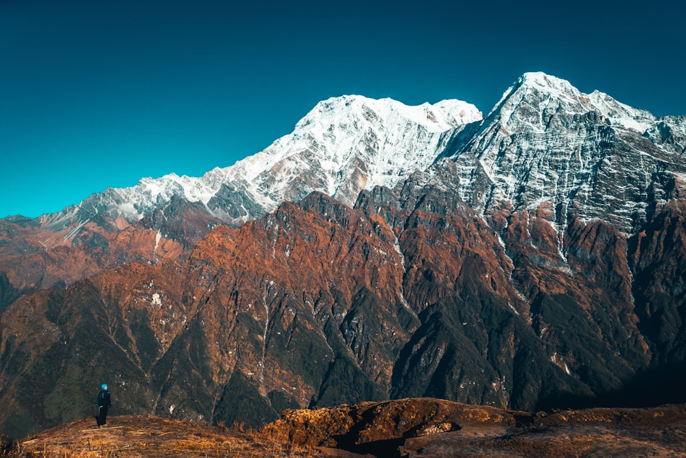 brown and white rocky mountain under blue sky during daytime