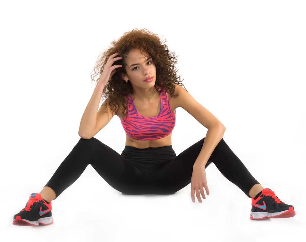 woman in black tank top and black leggings