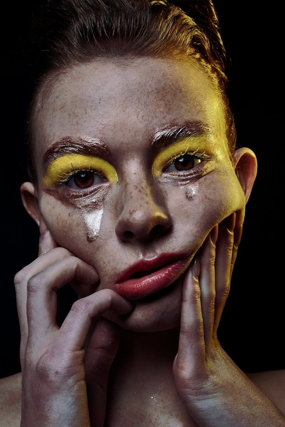 woman with red lipstick and brown eyes