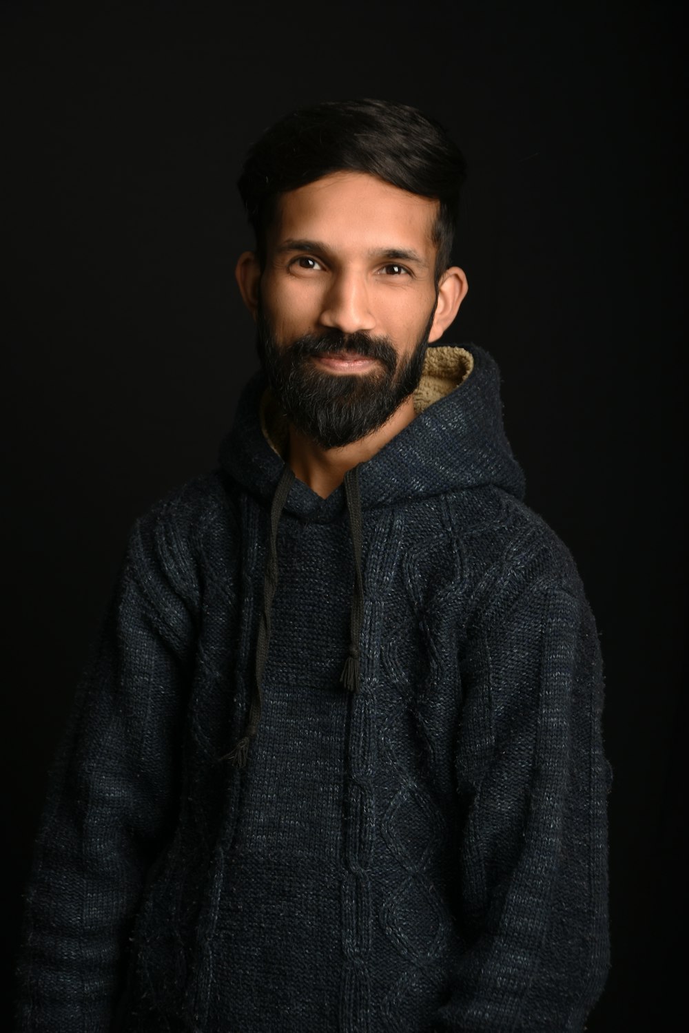 man in black zip up hoodie