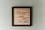 brown wooden quote wall decor