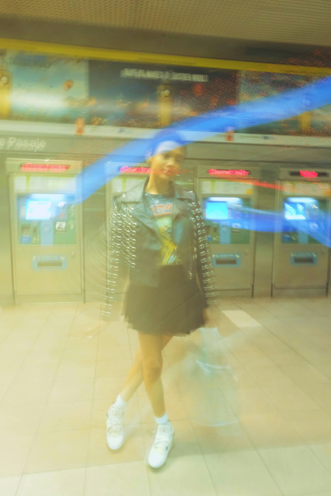 woman in black and white dress standing on train station