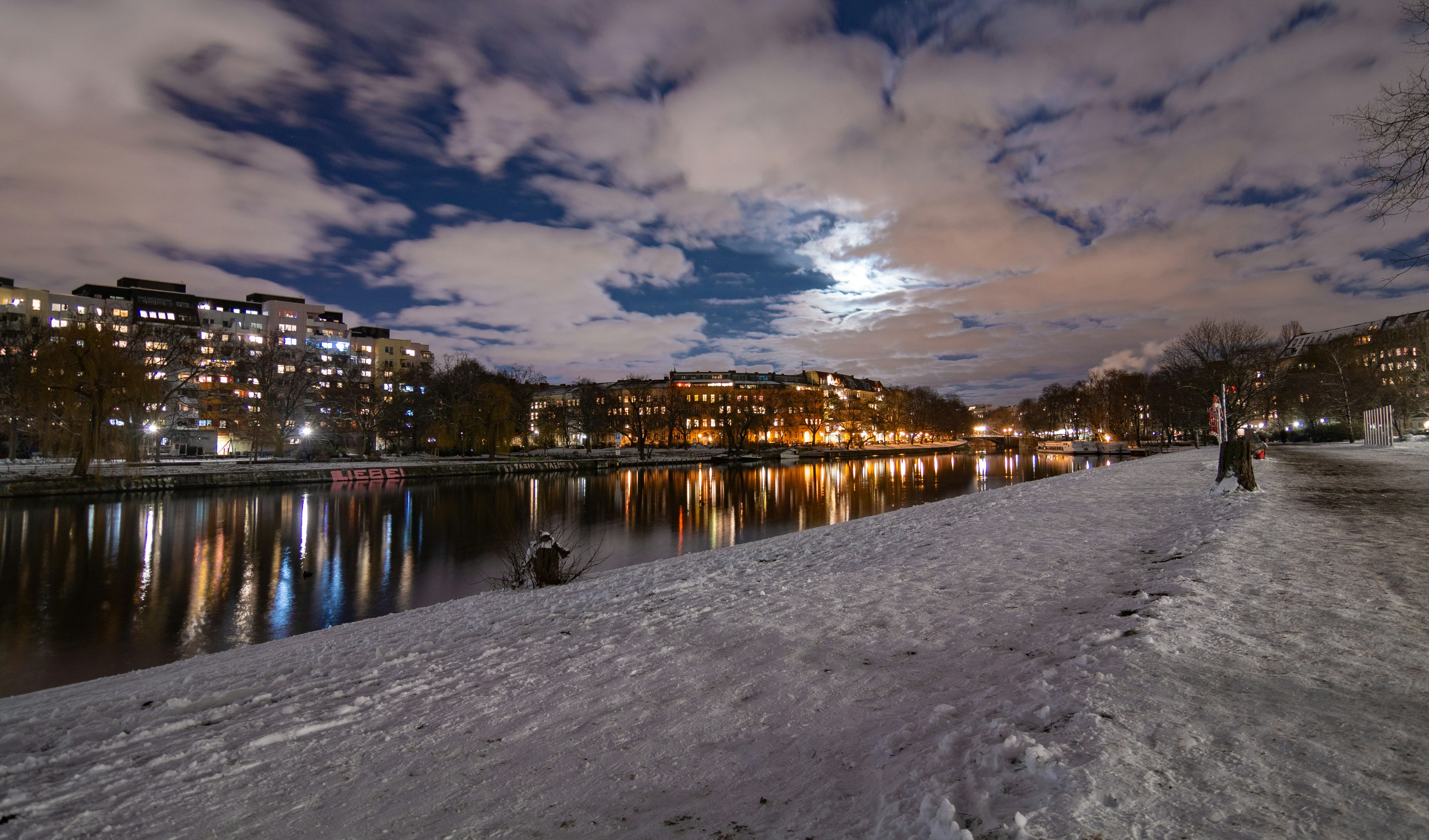 body of water near city during night time